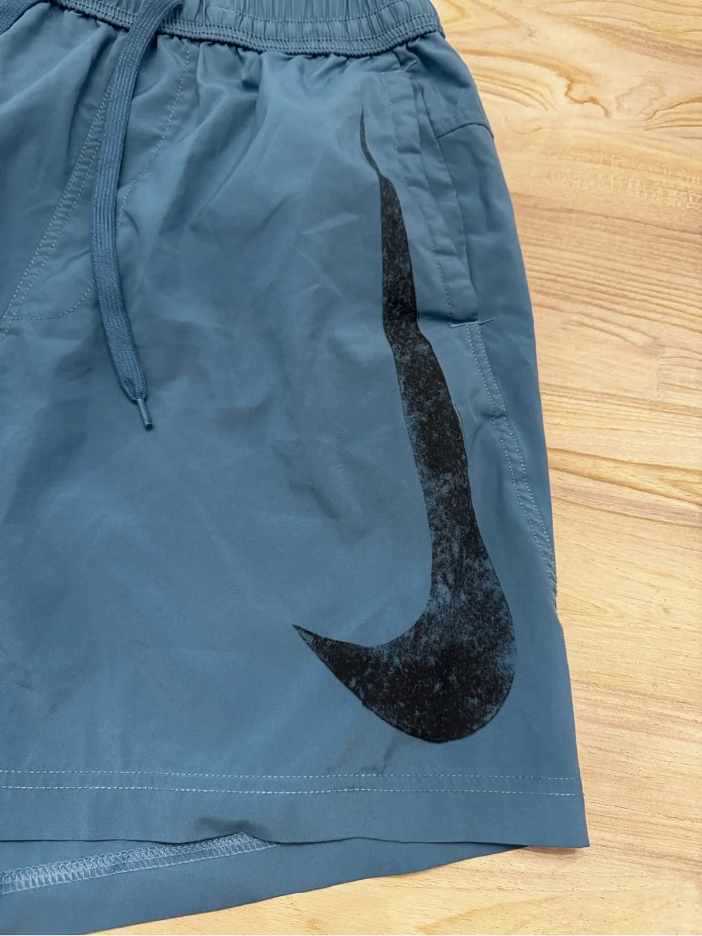 Nike Men's Teal Athletic Shorts with Big Black Swoosh